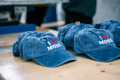 Omslag: Caps: I love Moss